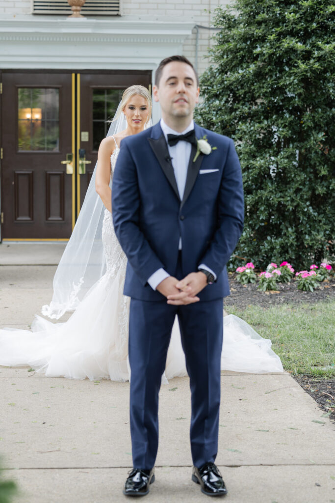 Bride and groom first look outside Madison Hotel, NJ wedding venue