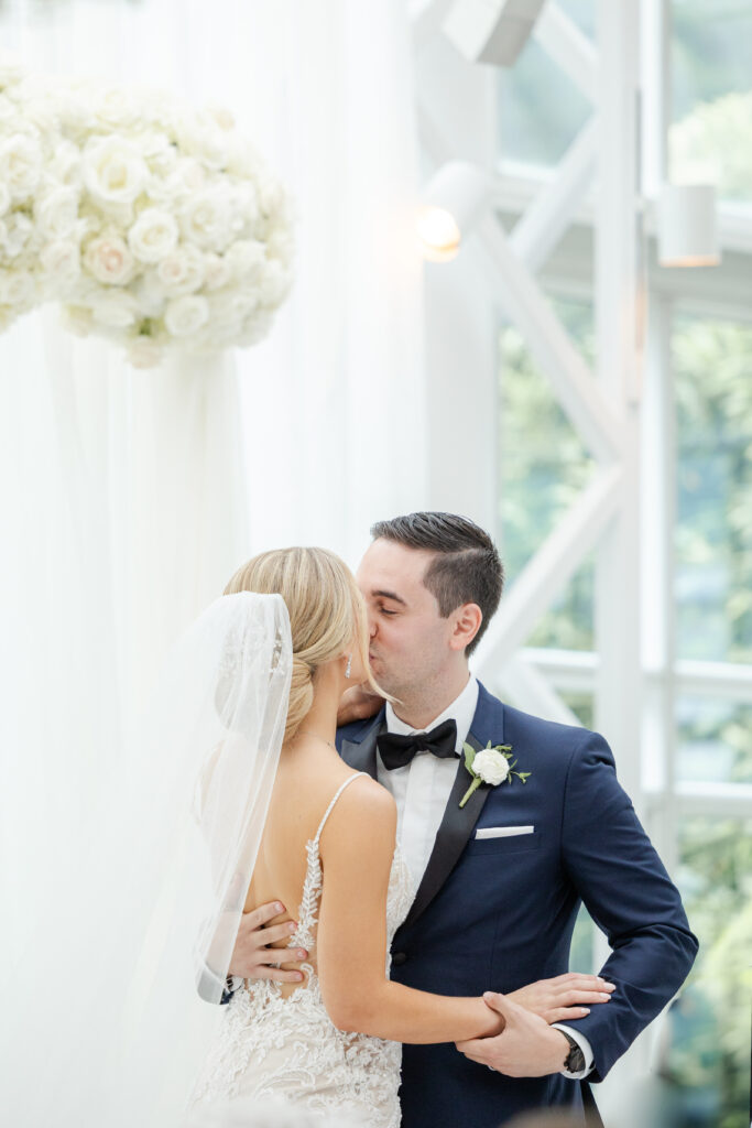 First kiss at wedding altar