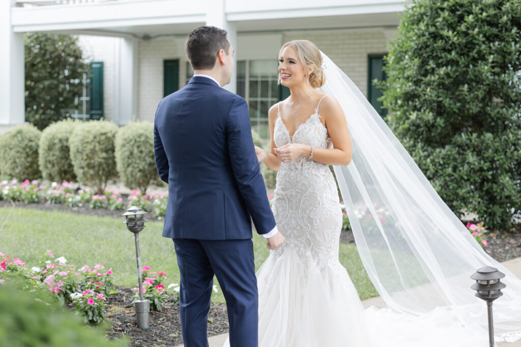 Bride and groom outdoor intimate moment after first look at Madison Hotel