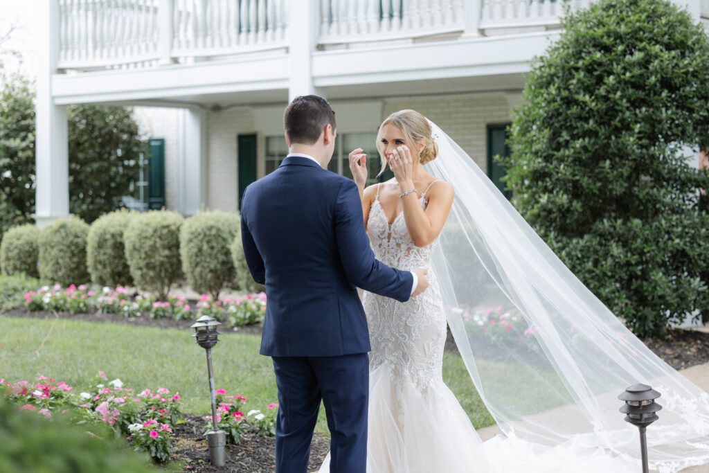 Bride and groom outdoor intimate moment after first look at Madison Hotel