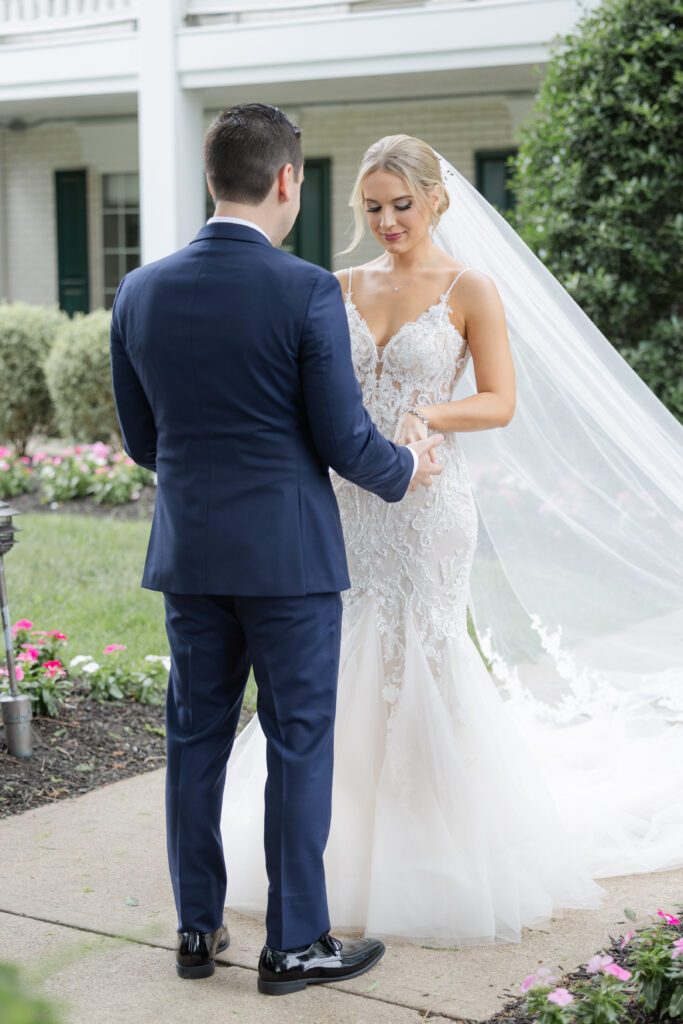 Bride and groom outdoor intimate moment after first look at Madison Hotel