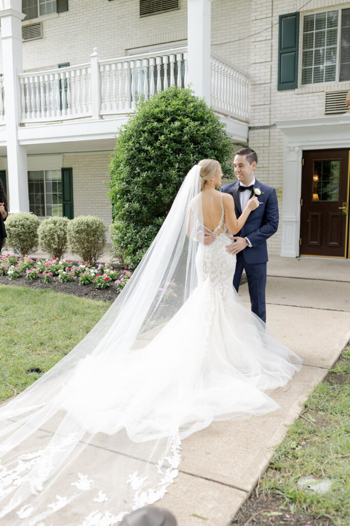 Bride and groom outside of Madison Hotel Wedding Venue