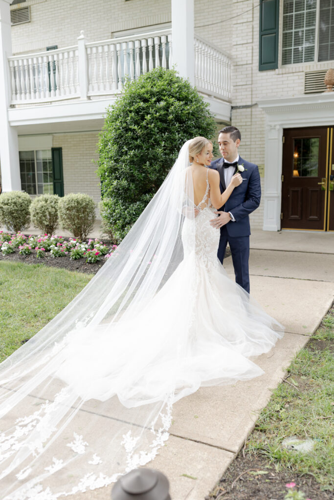 Bride and groom outside of Madison Hotel Wedding Venue