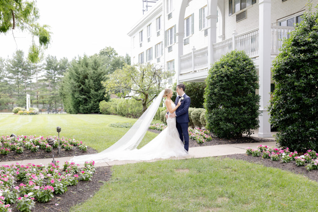 Bride and groom outside of Madison Hotel Wedding Venue