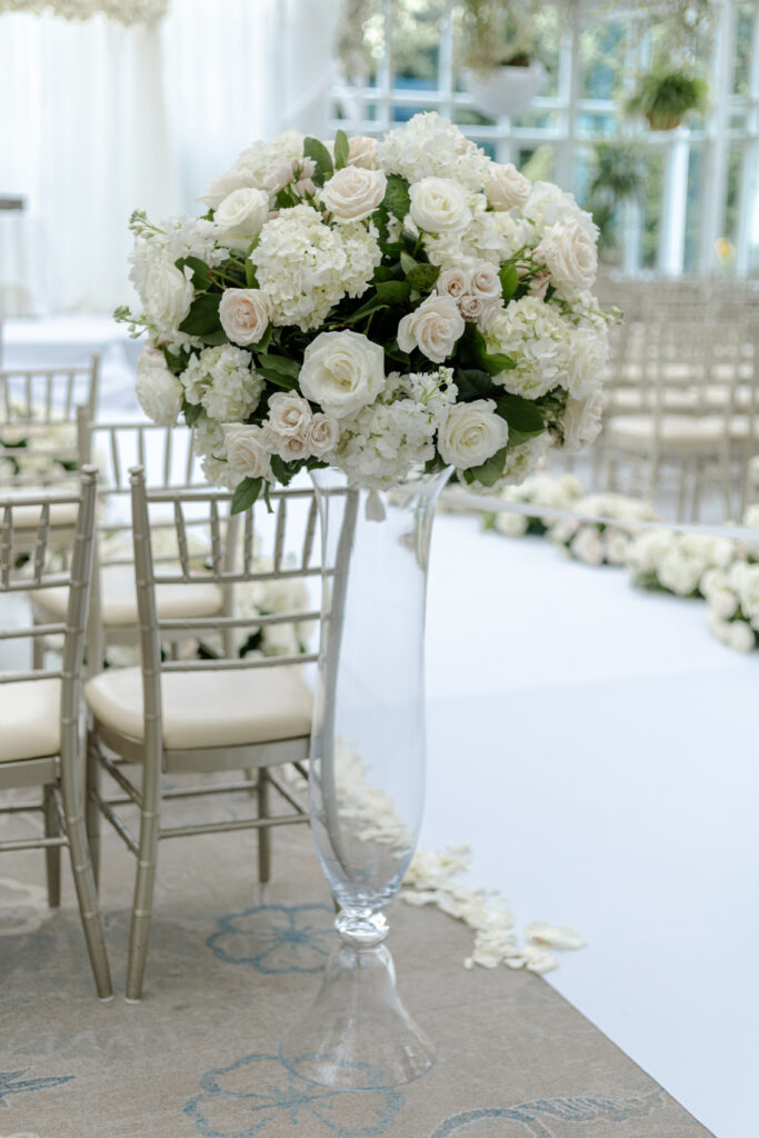 Wedding Ceremony centerpiece details inside Madison Hotel Conservatory 