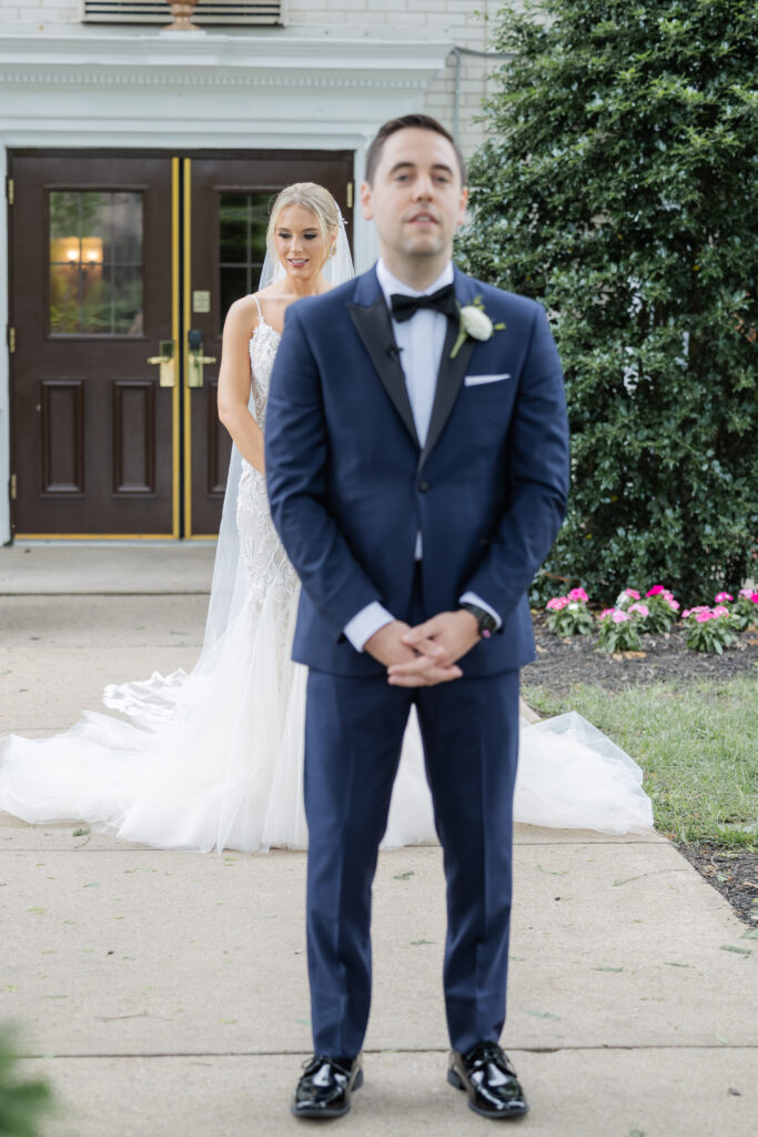 Bride and groom first look outside Madison Hotel, NJ wedding venue