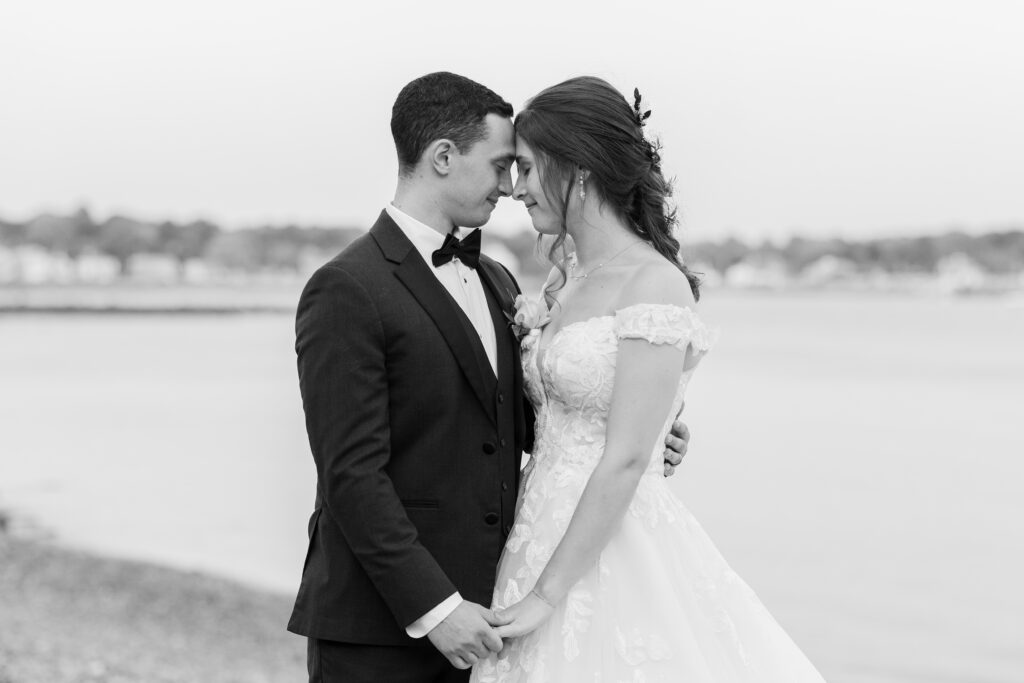 Black and white photo of bride and groom sunset photos