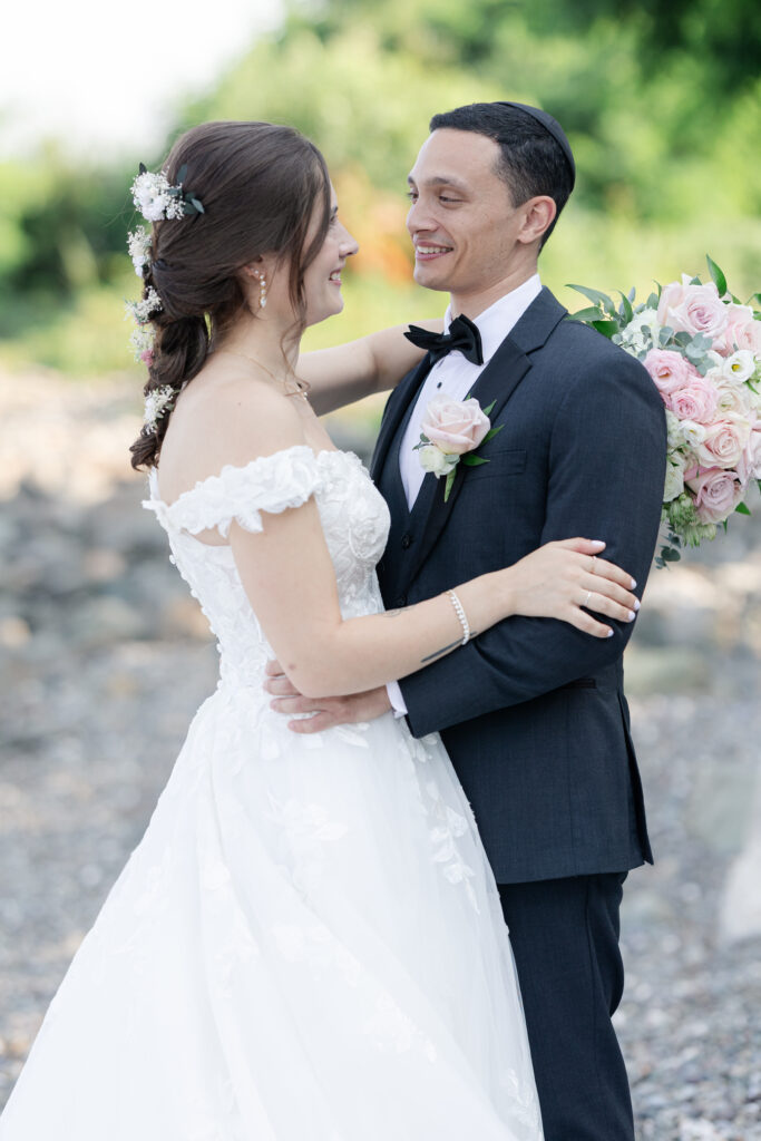 Outdoor bride and groom portraits at beach wedding