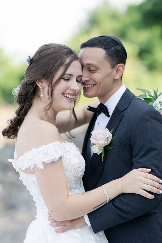 Outdoor bride and groom portraits at beach wedding