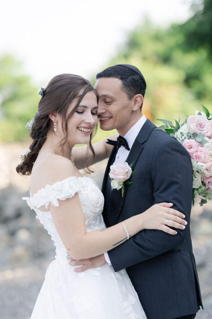 Outdoor bride and groom portraits at beach wedding