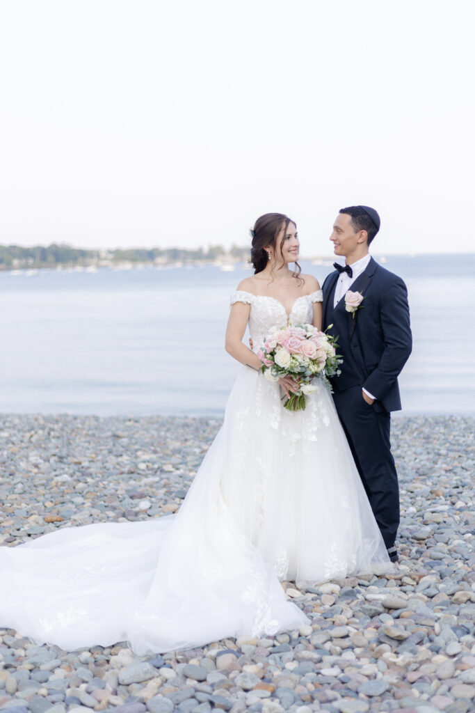 Sunset portraits outside Oceanview Nahant wedding venue