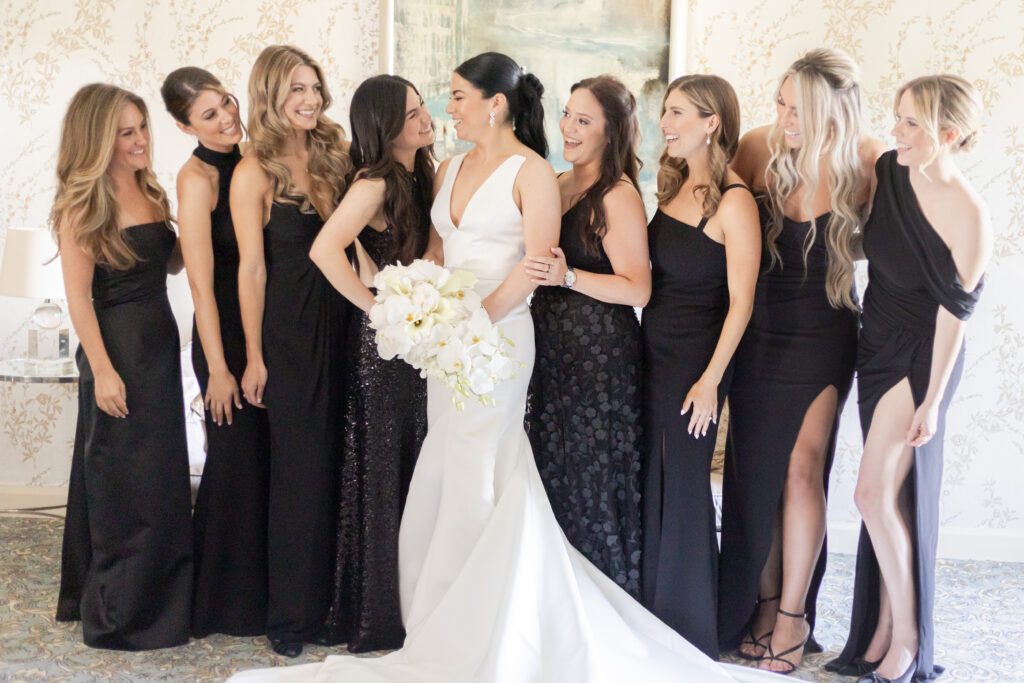 Bride and bridesmaid inside bridal suite