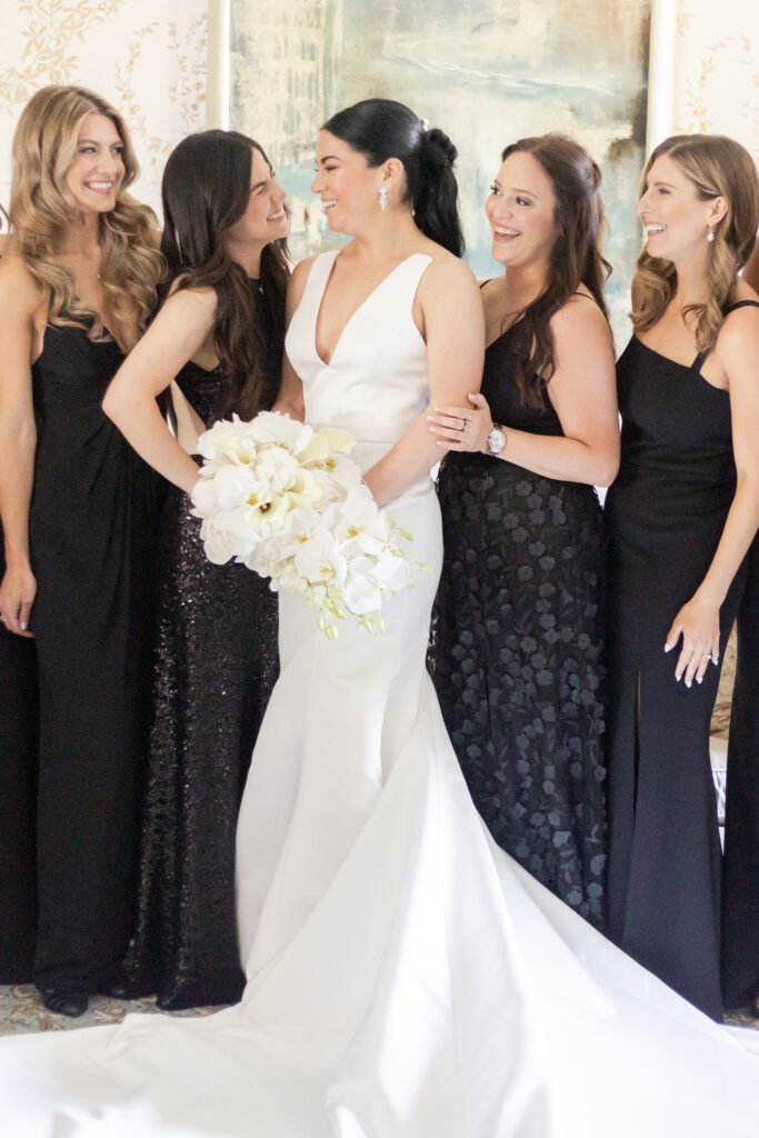 Bride and bridesmaid inside bridal suite