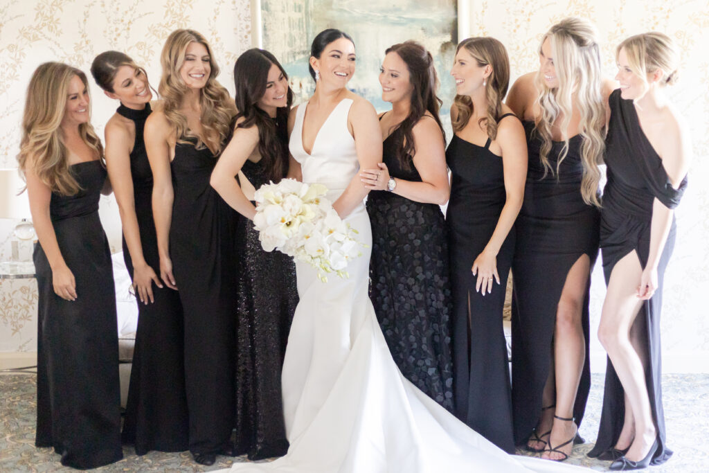 Bride and bridesmaid inside bridal suite