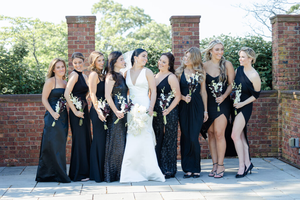 Bride and bridal party outside Westchester wedding venue