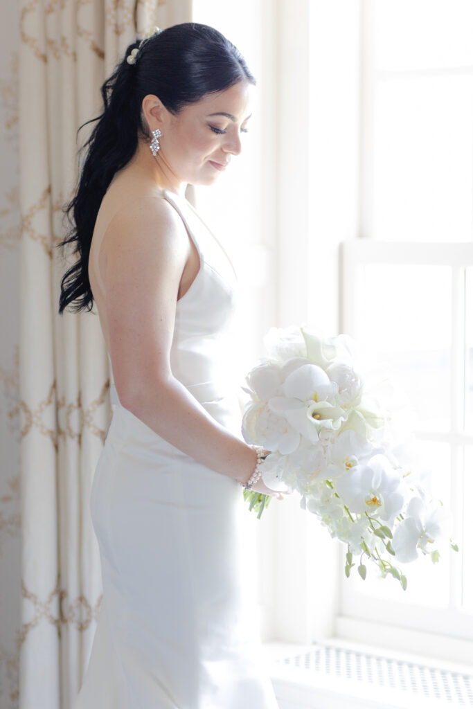 Bride with her white bouquet