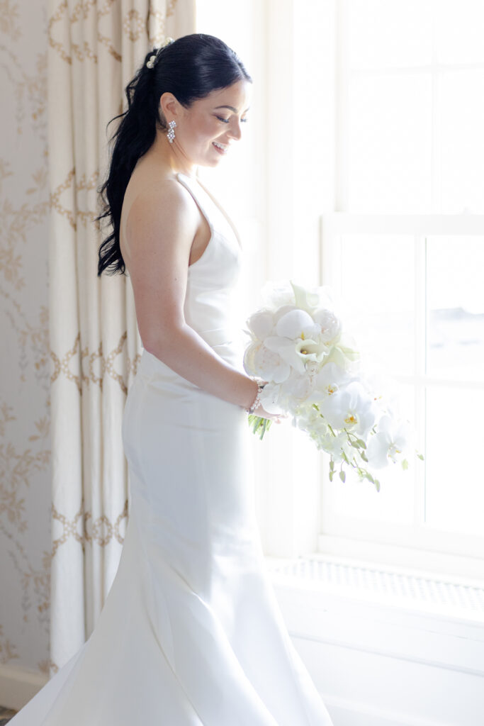 Bride with her white bouquet