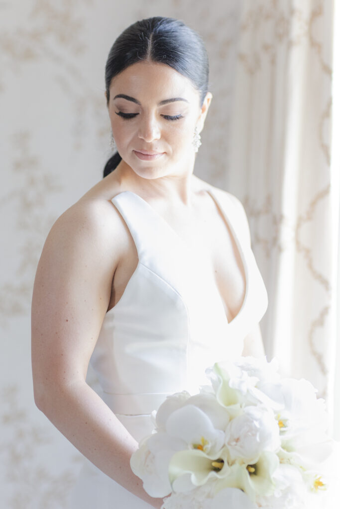 Bride with her white bouquet