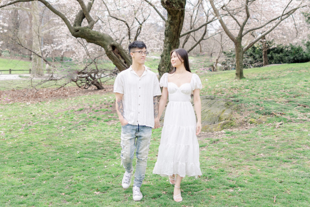 Couple In front of Cherry Blossom Photos at The Pilgrim Hill