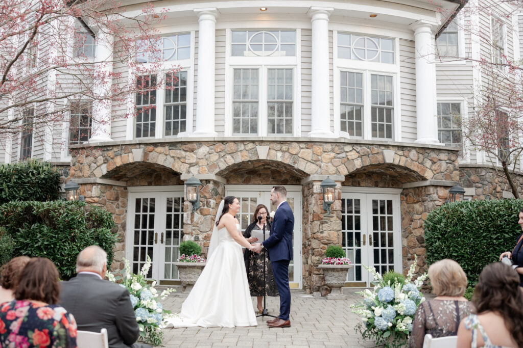 Bride and groom at outdoor wedding ceremony