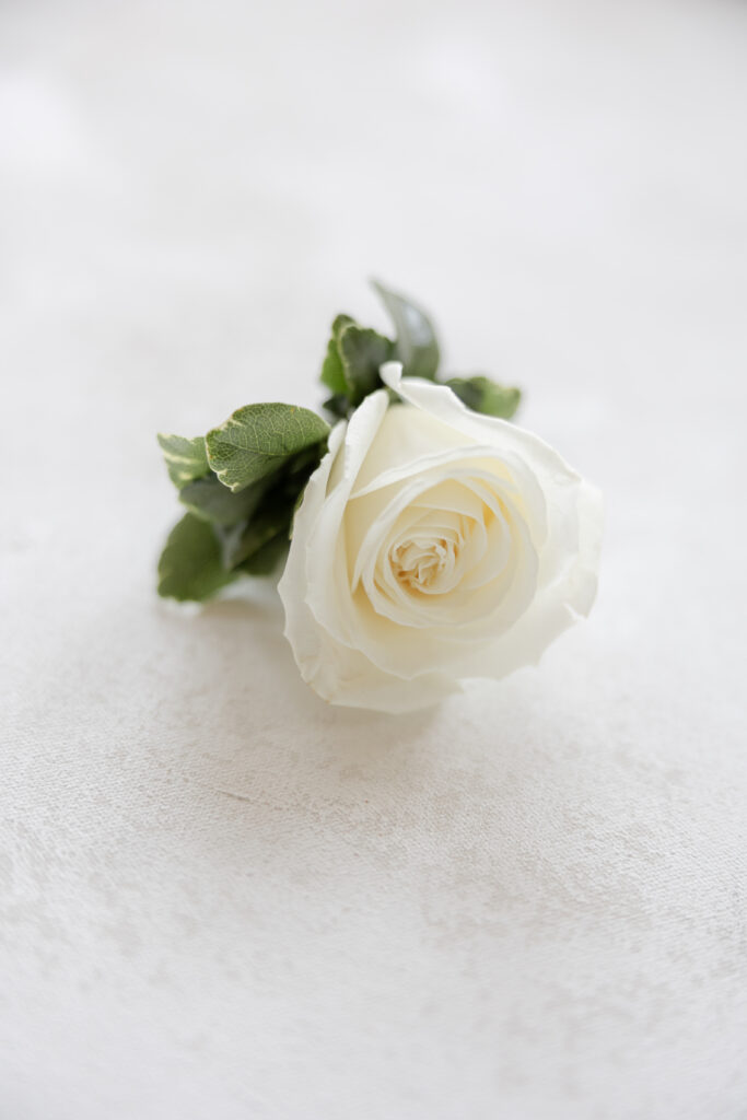 Groom boutonniere details closeup