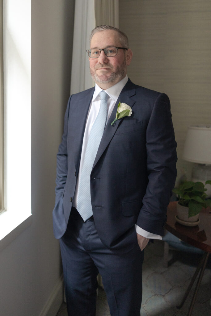 Groom with blue jacket suite