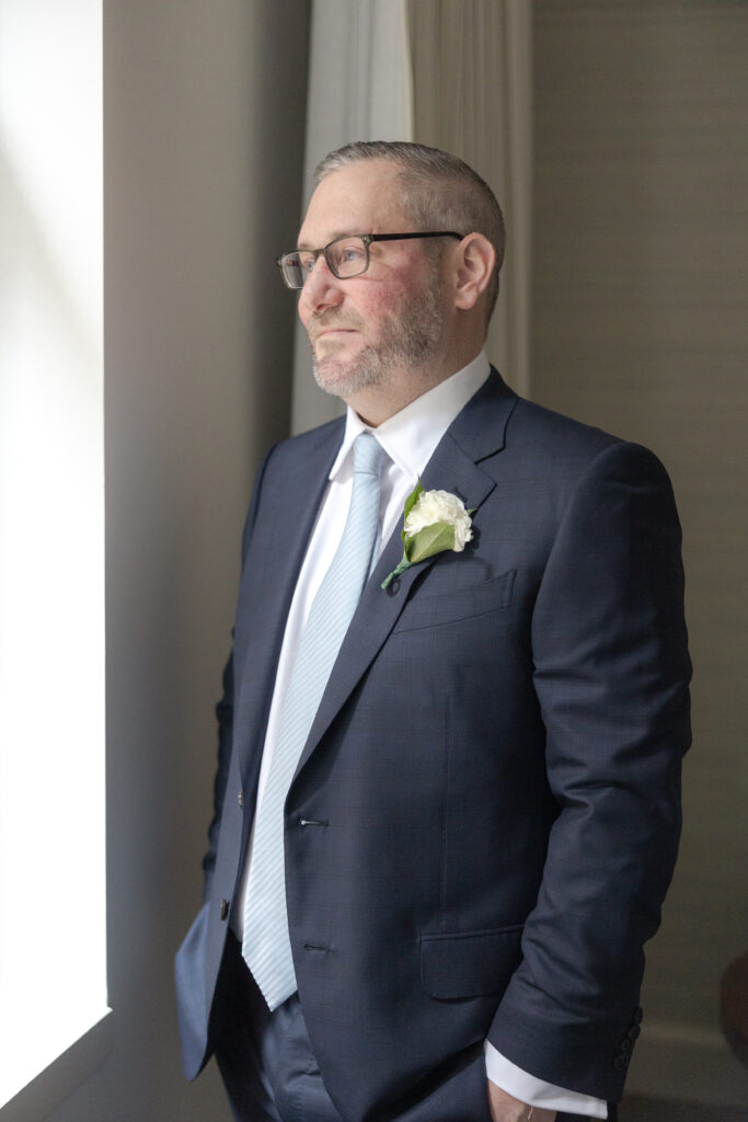 Groom with blue jacket suite