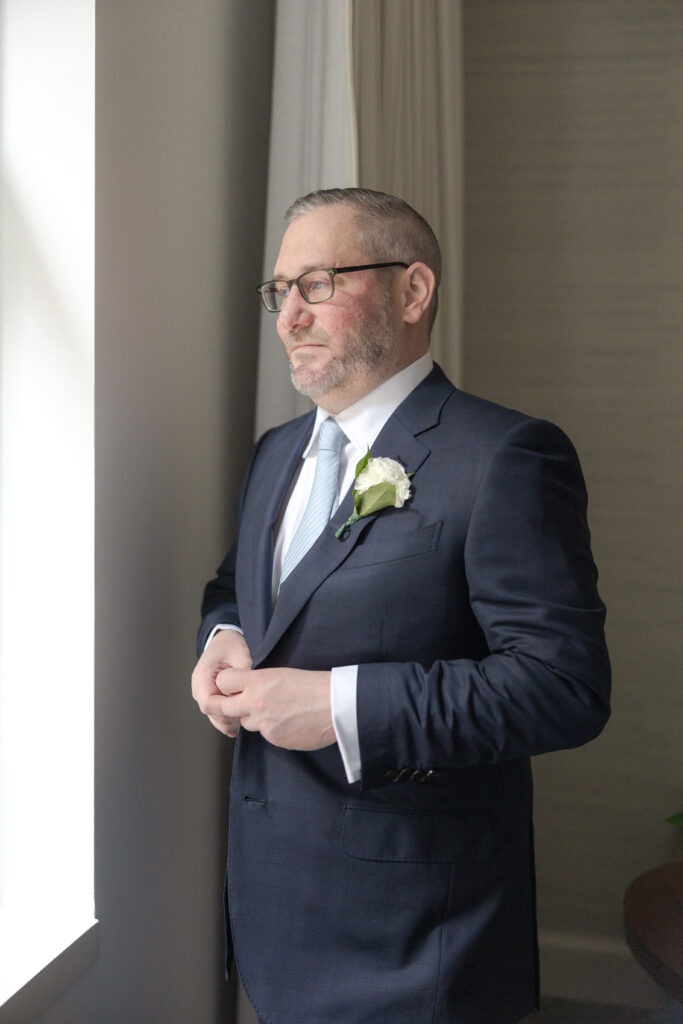 Groom with blue jacket suite