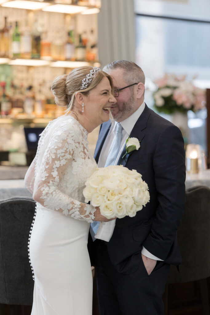 Bride and groom first look inside downtown hotel in fidi nyc