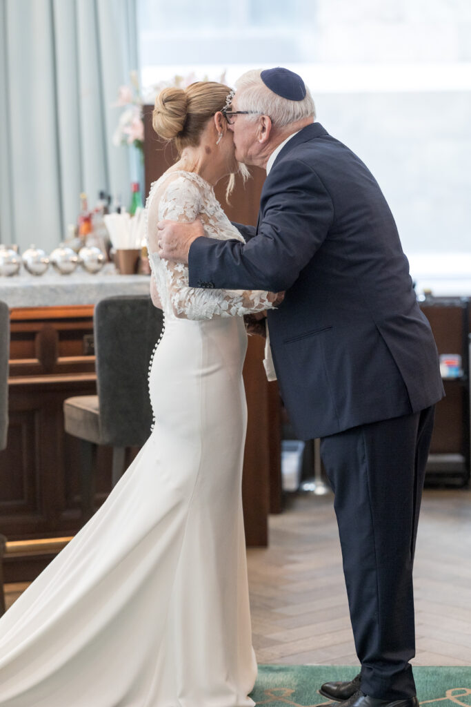 Bride and dad first look inside fidi hotel wedding venue