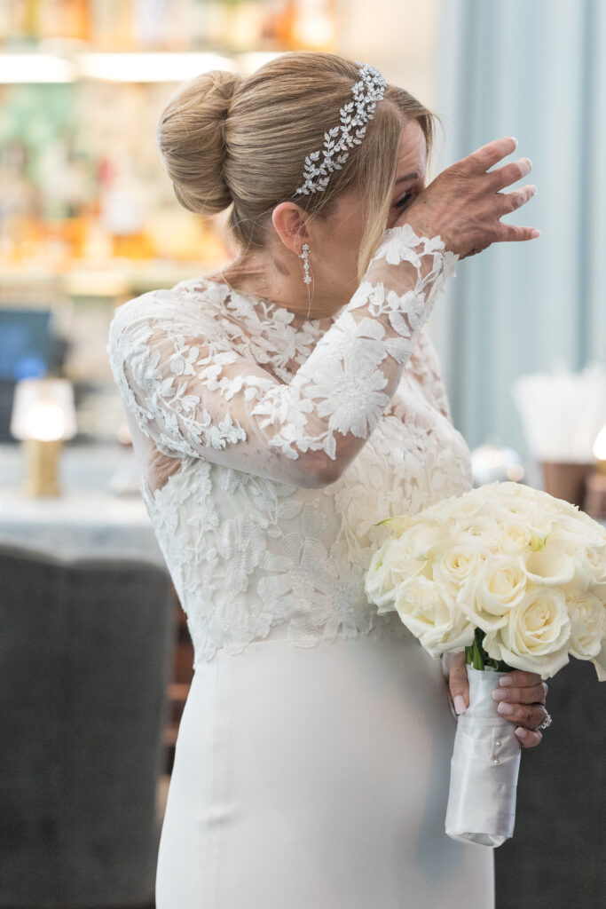 Bride crying during first look with dad