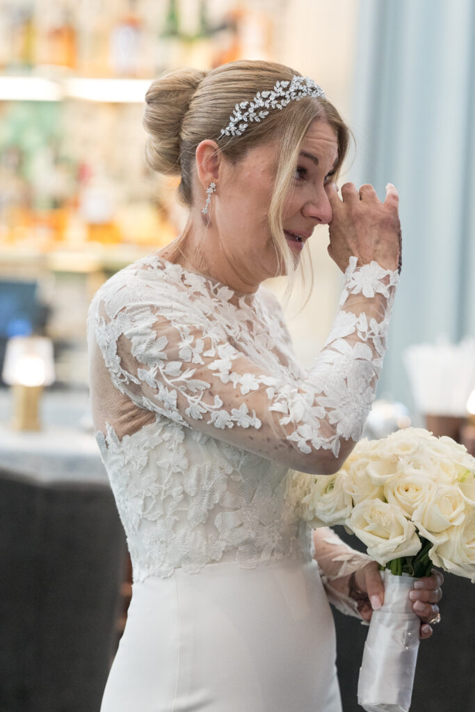 Bride wiping her tears