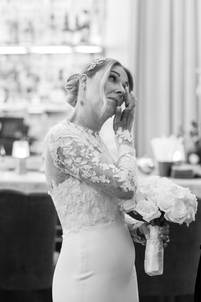 Bride wiping her tears