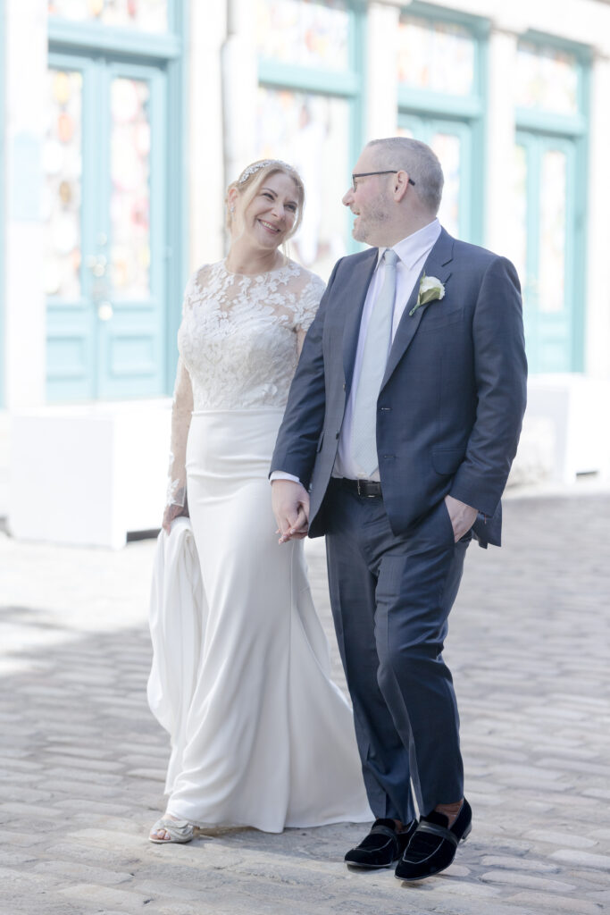 Bride and groom walking in Financial District area