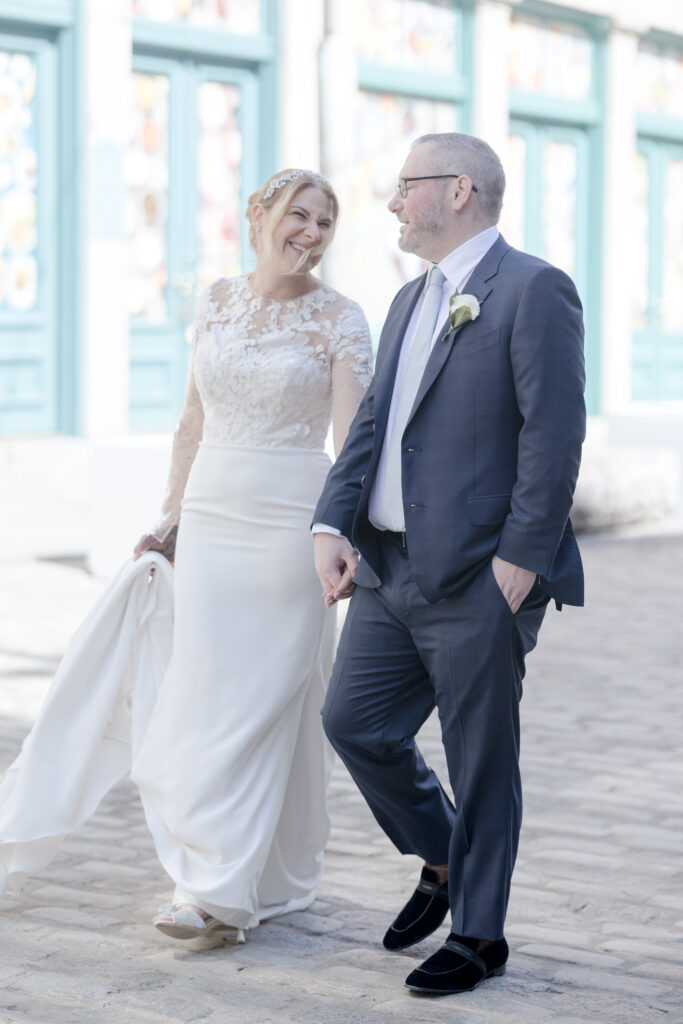 Bride and groom walking in Financial District area