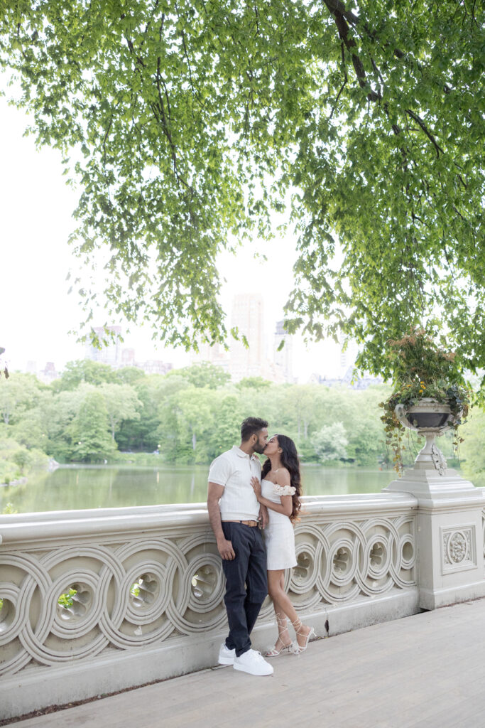 Romantic Spring Engagement Photos in NYC Bow Bridge