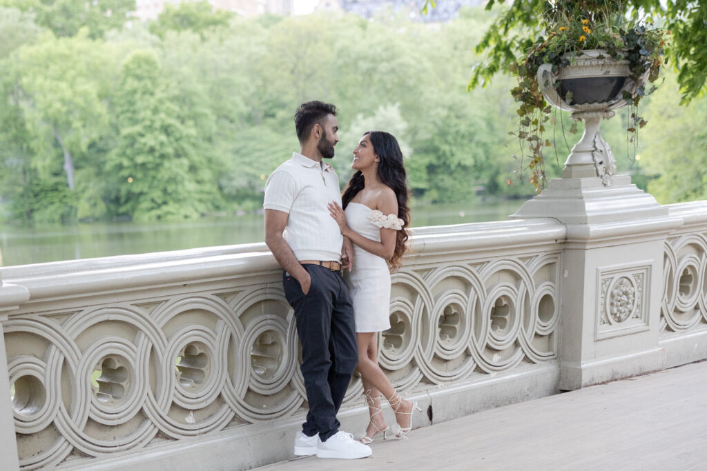 Romantic Spring Engagement Photos in NYC Bow Bridge