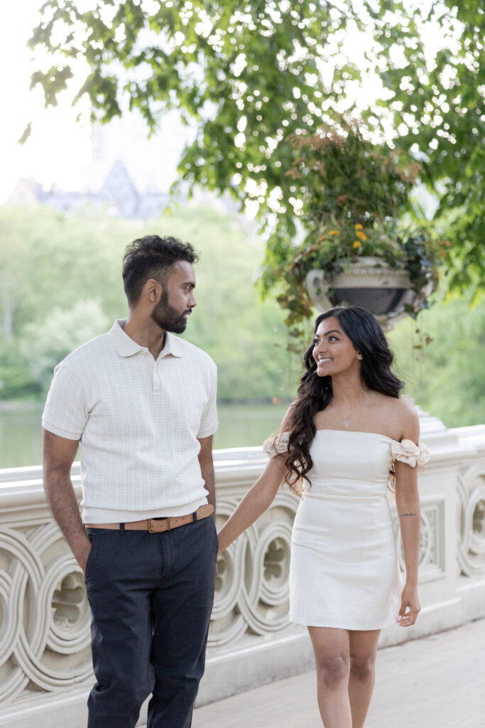 Romantic Spring Engagement Photos in NYC Bow Bridge