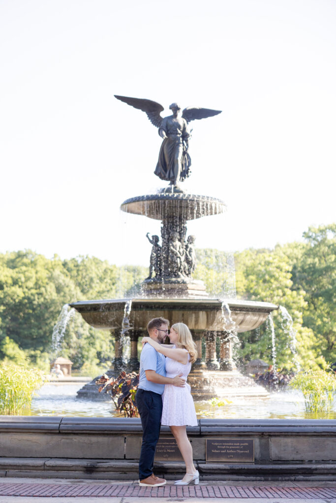 Romantic couple photos in front of Bethesda Fountain