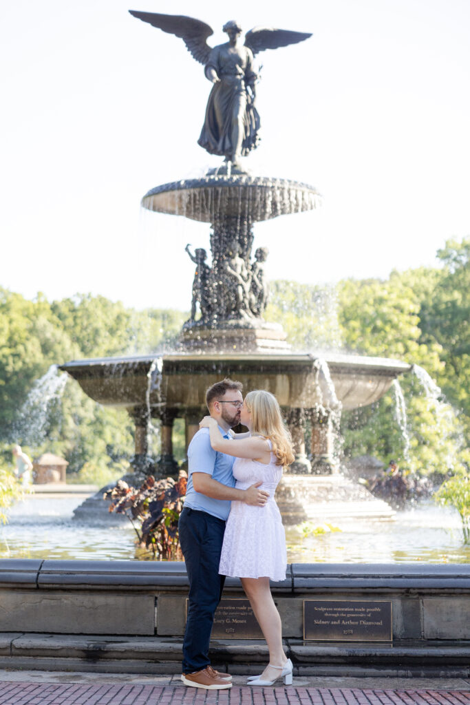 Romantic couple photos in front of Bethesda Fountain