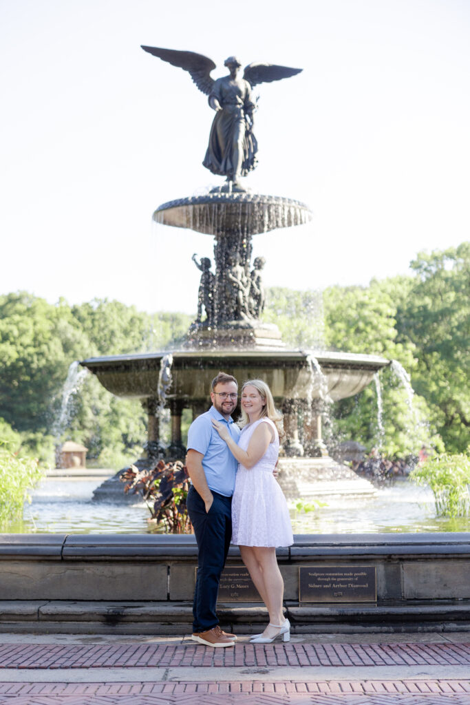 Romantic couple photos in front of Bethesda Fountain