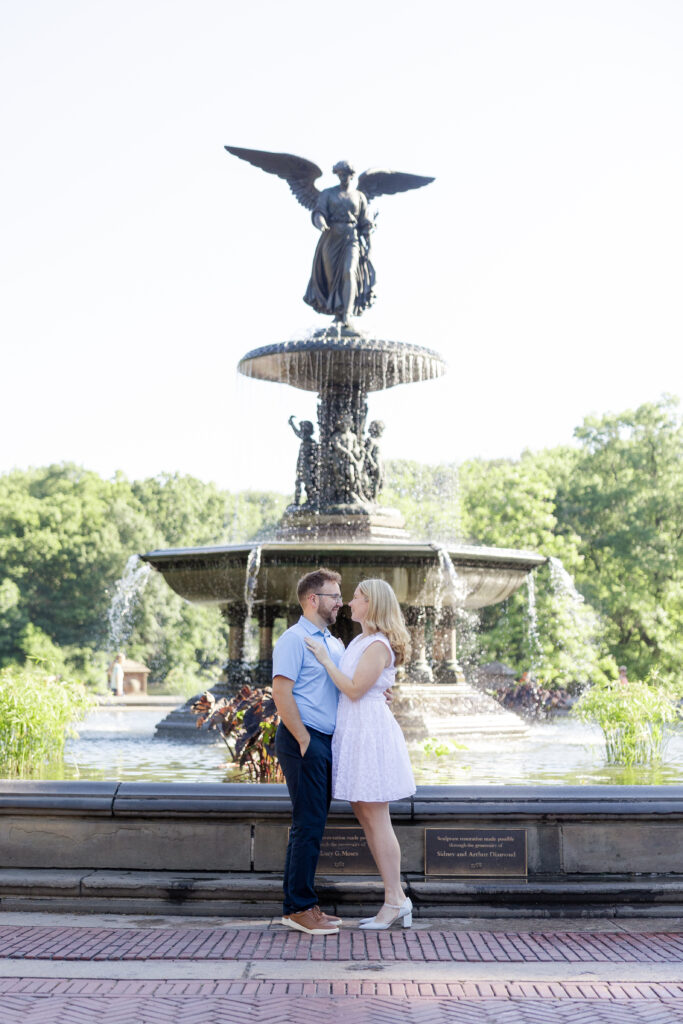 Romantic couple photos in front of Bethesda Fountain