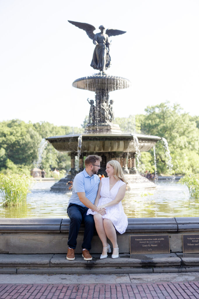 Romantic couple photos in front of Bethesda Fountain