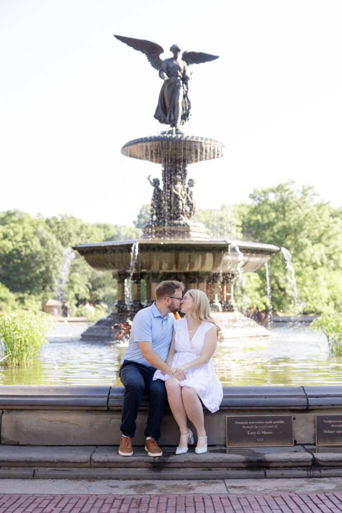 Romantic couple photos in front of Bethesda Fountain