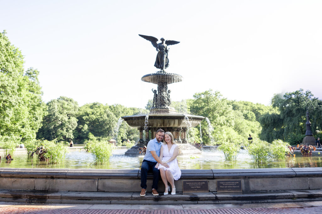 Couple photos in front of Bethesda Fountain