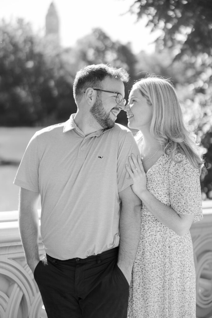 Black and white couple photos on Central Park Bow Bridge