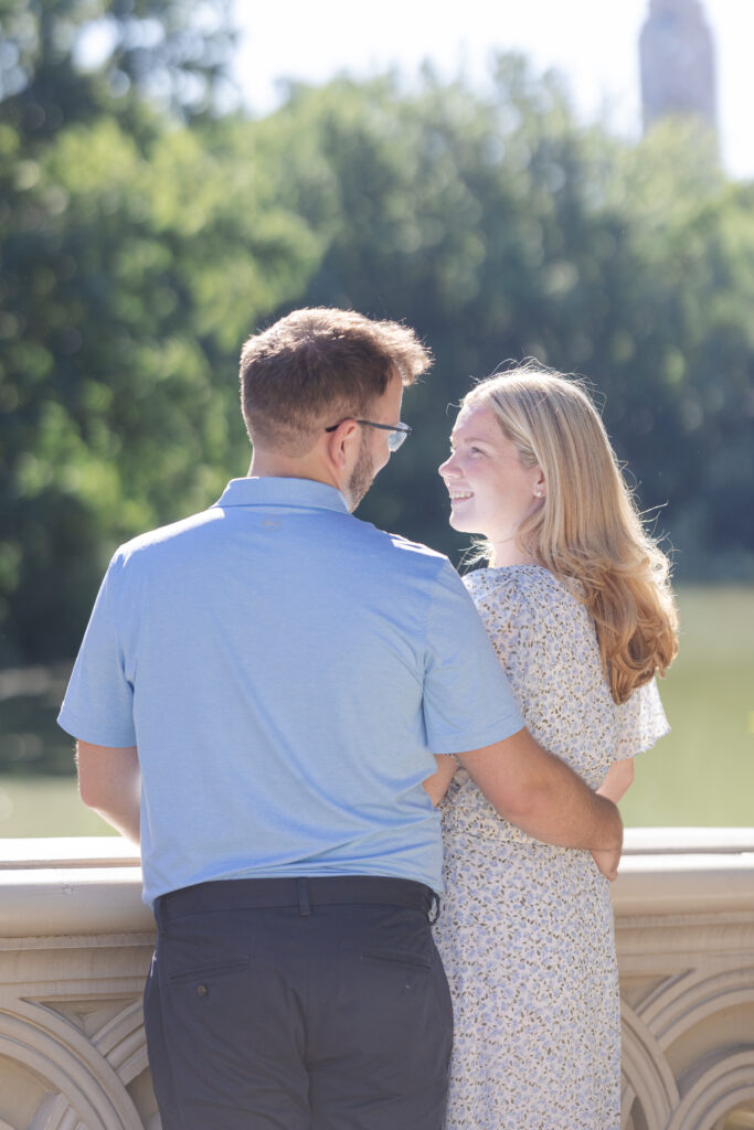 Couple photos on Central Park Bow Bridge