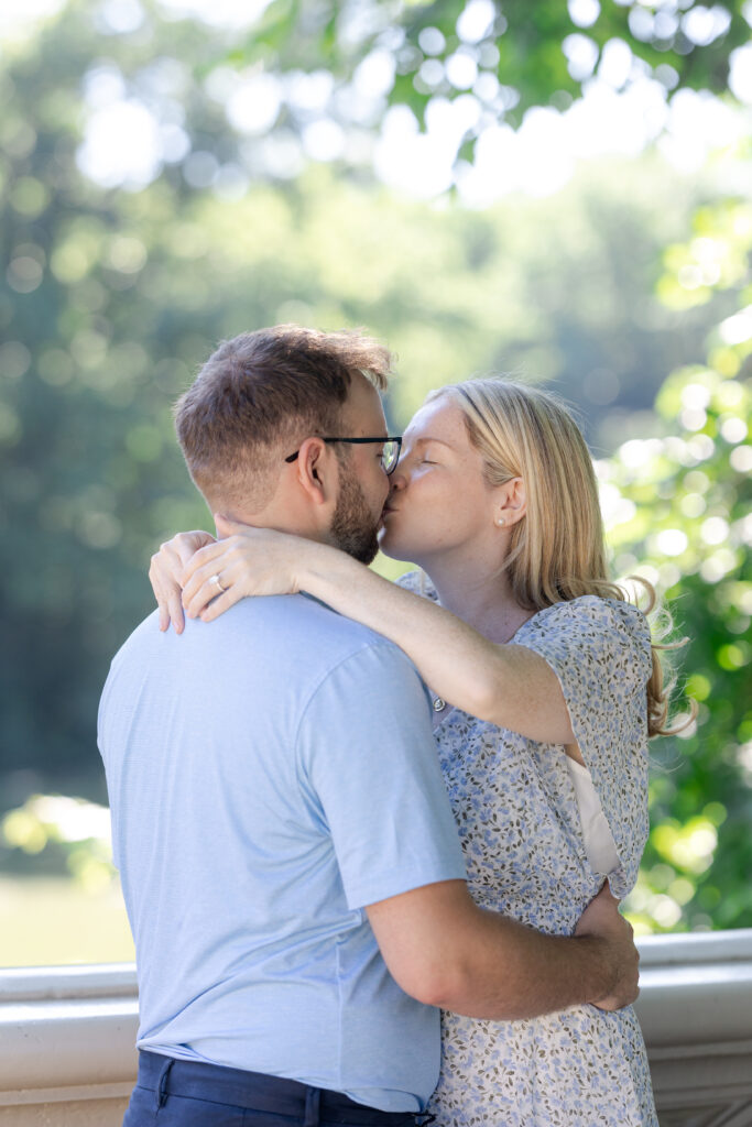 Couple photos on Central Park Bow Bridge