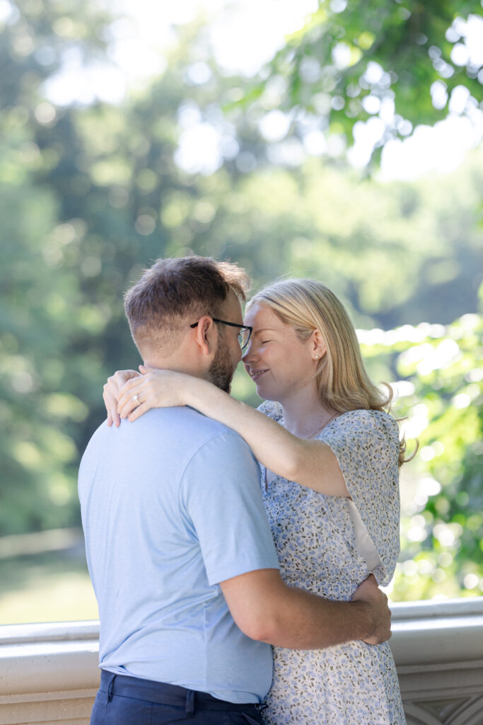 Couple photos on Central Park Bow Bridge