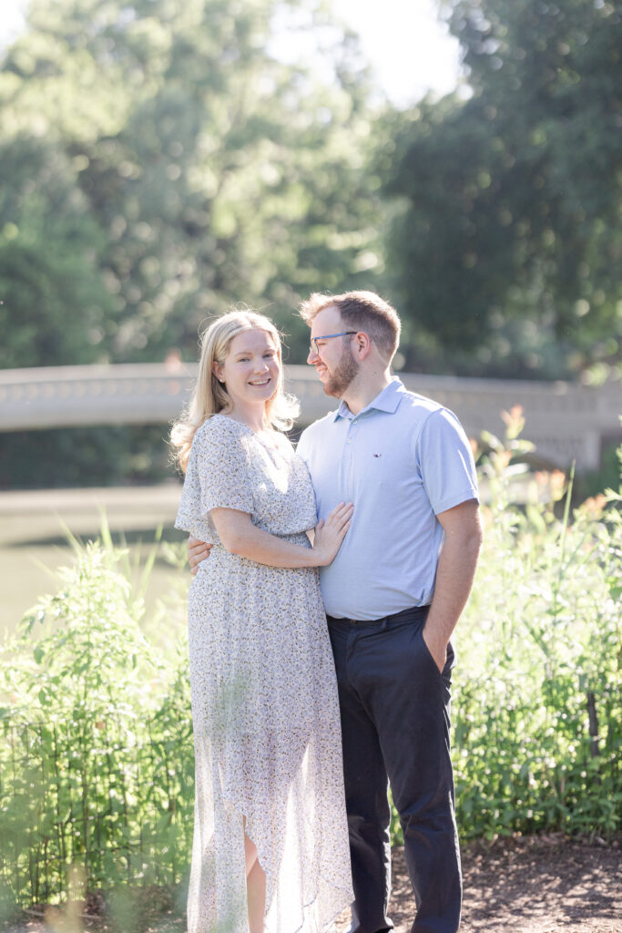 Central Park couple photos in front of Bow Bridge